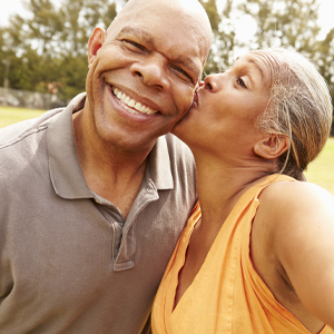 Last-minute retirement fixes you need to know Wife kissing husband on cheek