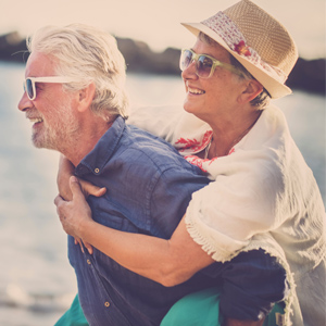 Money Moves it's Never too Late to Make Senior couple at beach
