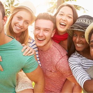 Ways to Stop Overspending with Friends Group of friends hanging out