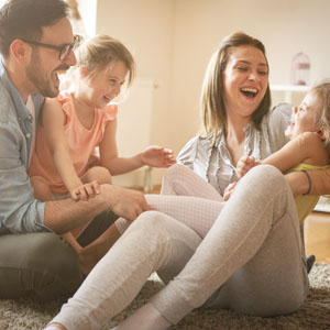 7 Tips to Help You Get Out of Debt Happy family